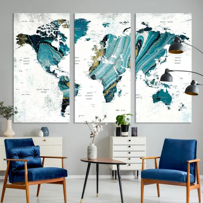 The modern living room features the World Map Wall Art Canvas Print, a three-panel abstract design on museum-quality canvases. The artwork includes a UV-protective coating and is ready to hang.