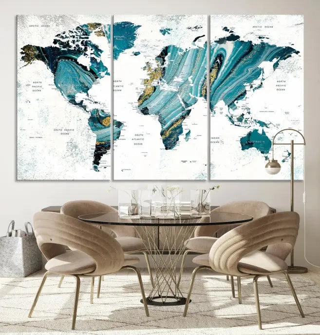 The modern living room features the World Map Wall Art Canvas Print, a three-panel abstract design on museum-quality canvases. The artwork includes a UV-protective coating and is ready to hang.