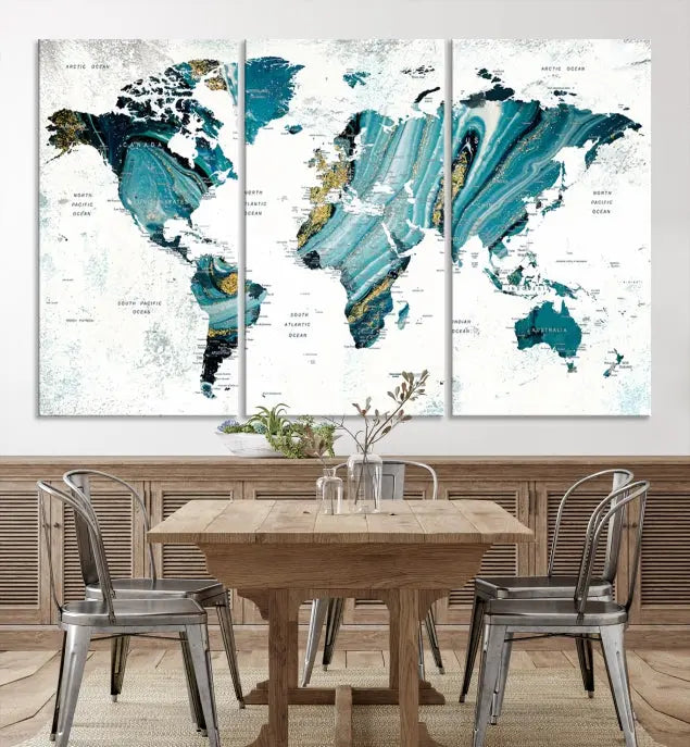 The modern living room features the World Map Wall Art Canvas Print, a three-panel abstract design on museum-quality canvases. The artwork includes a UV-protective coating and is ready to hang.