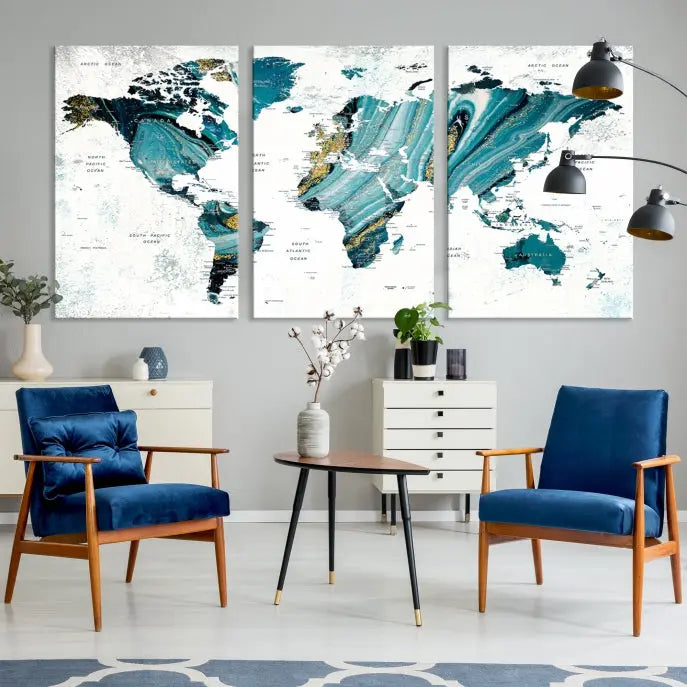 The modern living room features the World Map Wall Art Canvas Print, a three-panel abstract design on museum-quality canvases. The artwork includes a UV-protective coating and is ready to hang.