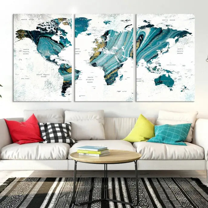 The modern living room features the World Map Wall Art Canvas Print, a three-panel abstract design on museum-quality canvases. The artwork includes a UV-protective coating and is ready to hang.