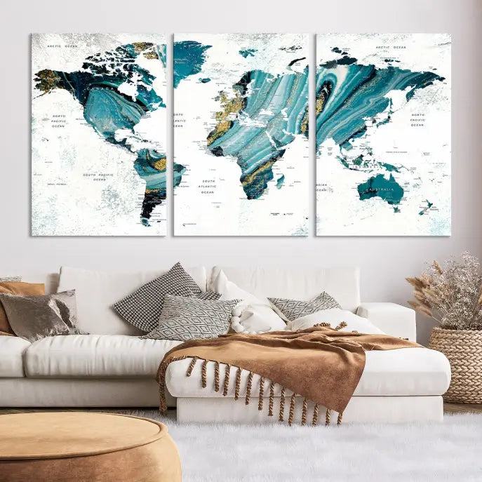 The modern living room features the World Map Wall Art Canvas Print, a three-panel abstract design on museum-quality canvases. The artwork includes a UV-protective coating and is ready to hang.