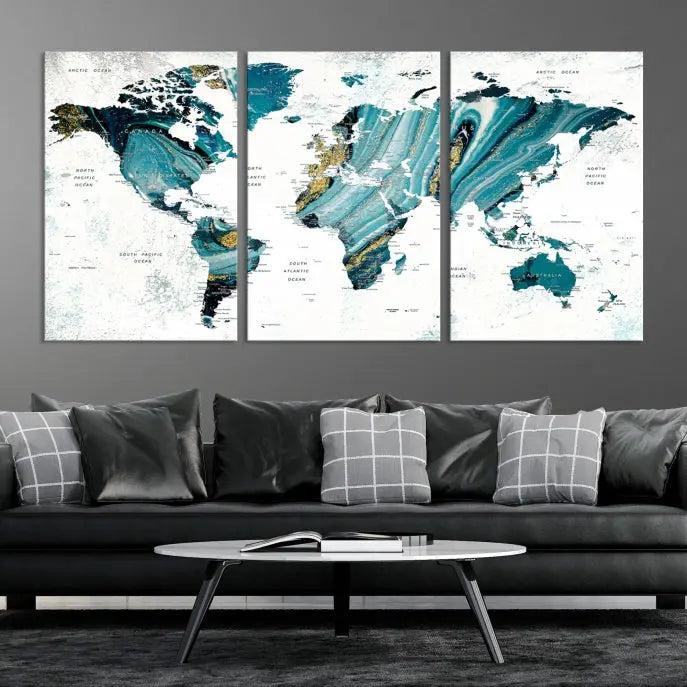 The modern living room features the World Map Wall Art Canvas Print, a three-panel abstract design on museum-quality canvases. The artwork includes a UV-protective coating and is ready to hang.