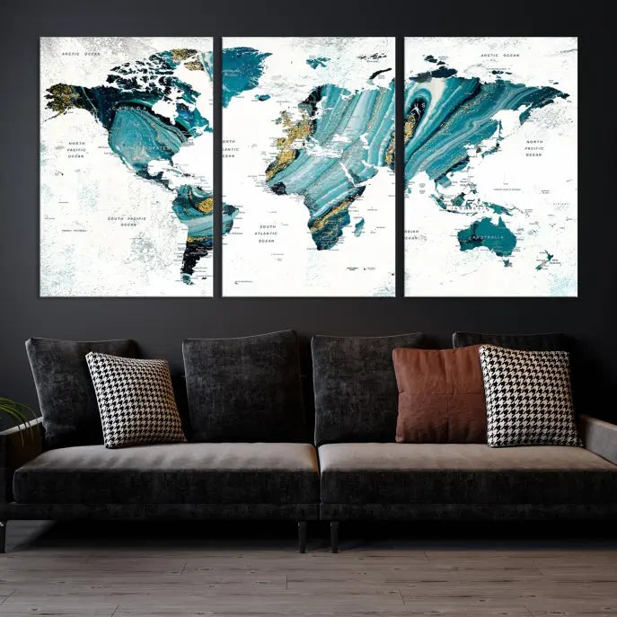 The modern living room features the World Map Wall Art Canvas Print, a three-panel abstract design on museum-quality canvases. The artwork includes a UV-protective coating and is ready to hang.