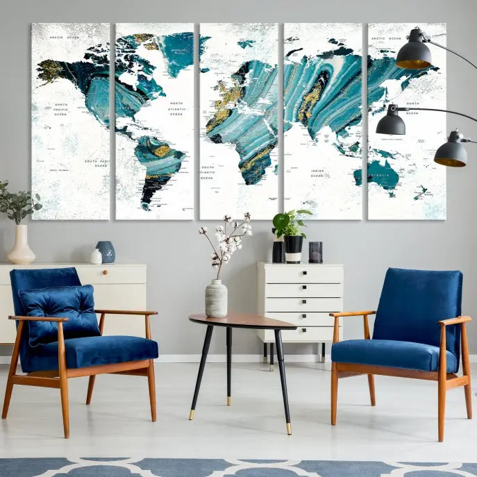 The modern living room features the World Map Wall Art Canvas Print, a three-panel abstract design on museum-quality canvases. The artwork includes a UV-protective coating and is ready to hang.