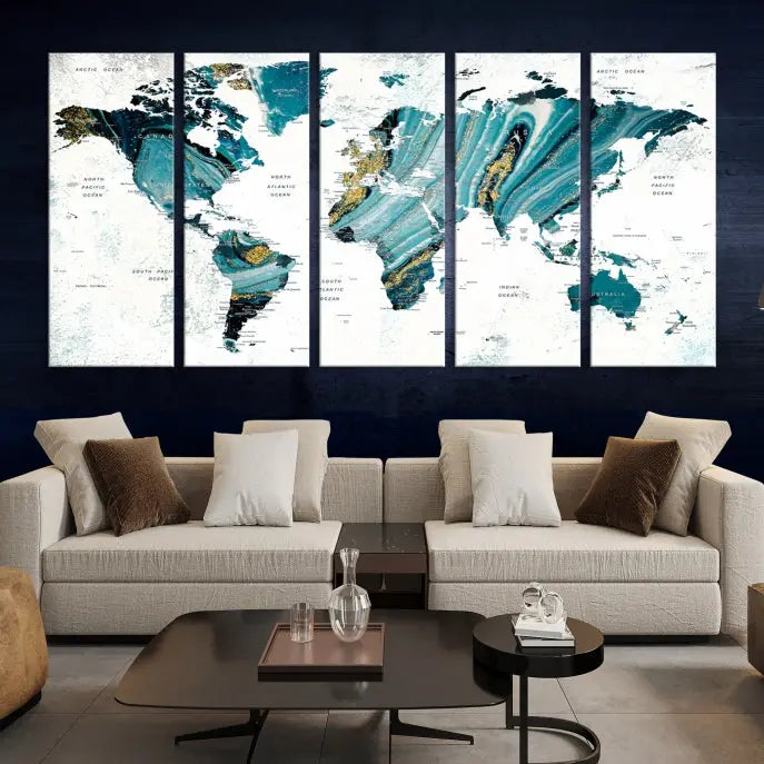 The modern living room features the World Map Wall Art Canvas Print, a three-panel abstract design on museum-quality canvases. The artwork includes a UV-protective coating and is ready to hang.