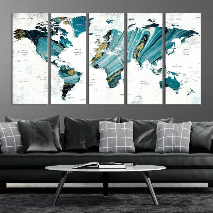 The modern living room features the World Map Wall Art Canvas Print, a three-panel abstract design on museum-quality canvases. The artwork includes a UV-protective coating and is ready to hang.