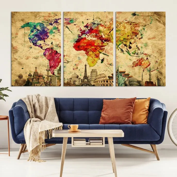 The World Map Wall Art Canvas Print is a museum-quality triptych featuring a vivid world map adorned with famous landmarks underneath. Each panel is expertly framed to add an air of sophistication to any space.