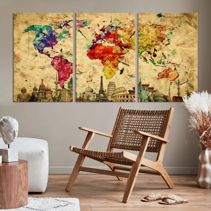 The World Map Wall Art Canvas Print is a museum-quality triptych featuring a vivid world map adorned with famous landmarks underneath. Each panel is expertly framed to add an air of sophistication to any space.