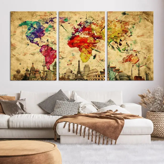 The World Map Wall Art Canvas Print is a museum-quality triptych featuring a vivid world map adorned with famous landmarks underneath. Each panel is expertly framed to add an air of sophistication to any space.