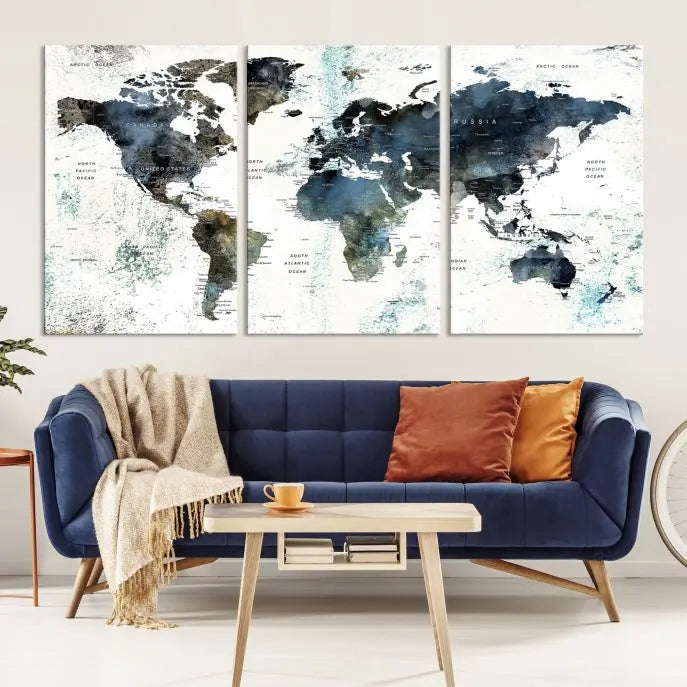 The 5-panel World Map Wall Art Print is displayed on a dark wall. Crafted on museum-quality canvas with a UV-protective coating, it comes ready to hang for an instant touch of elegance.