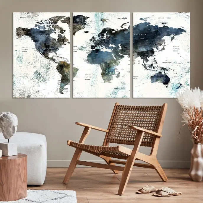 The 5-panel World Map Wall Art Print is displayed on a dark wall. Crafted on museum-quality canvas with a UV-protective coating, it comes ready to hang for an instant touch of elegance.