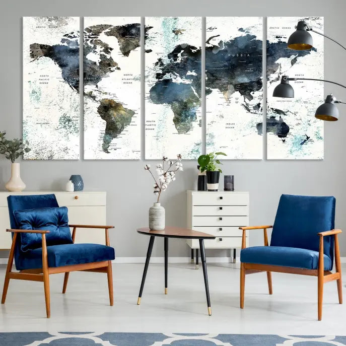 The 5-panel World Map Wall Art Print is displayed on a dark wall. Crafted on museum-quality canvas with a UV-protective coating, it comes ready to hang for an instant touch of elegance.