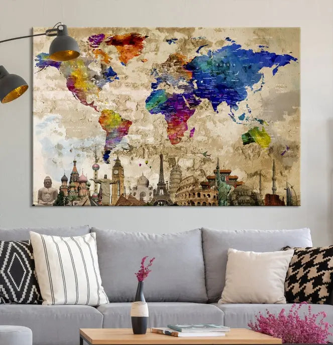 The World Map Wall Art Watercolor Canvas Print, featuring a UV-protective coating, is displayed in a cozy living room setting.