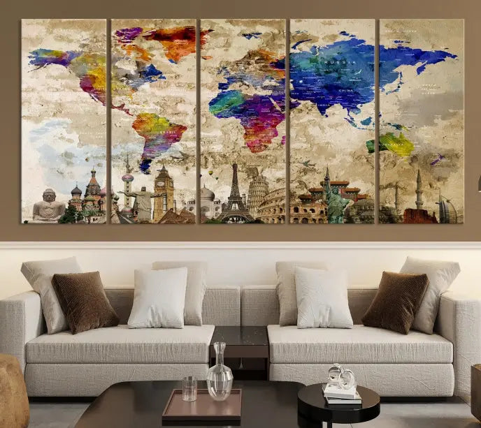 The World Map Wall Art Watercolor Canvas Print, featuring a UV-protective coating, is displayed in a cozy living room setting.