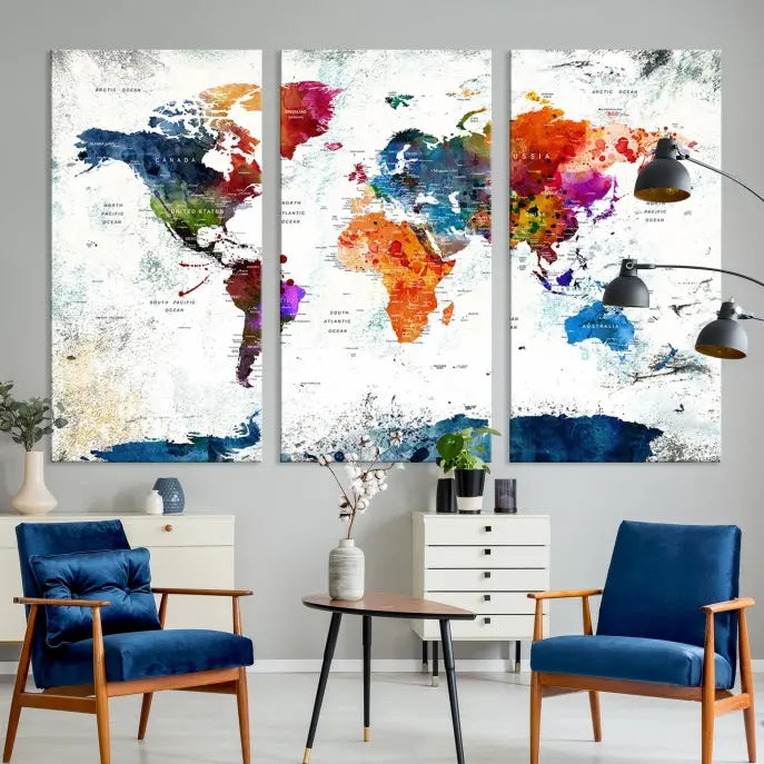 A modern living room boasting a vibrant World Map Wall Art Watercolor Map Canvas Print on the wall.