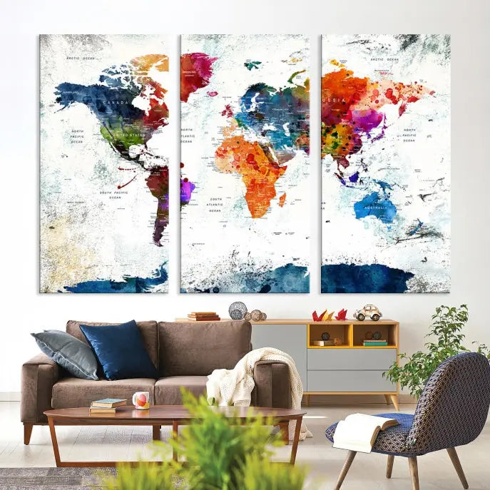 A modern living room boasting a vibrant World Map Wall Art Watercolor Map Canvas Print on the wall.