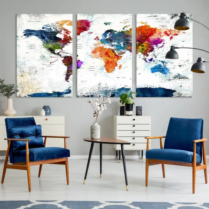 A modern living room boasting a vibrant World Map Wall Art Watercolor Map Canvas Print on the wall.