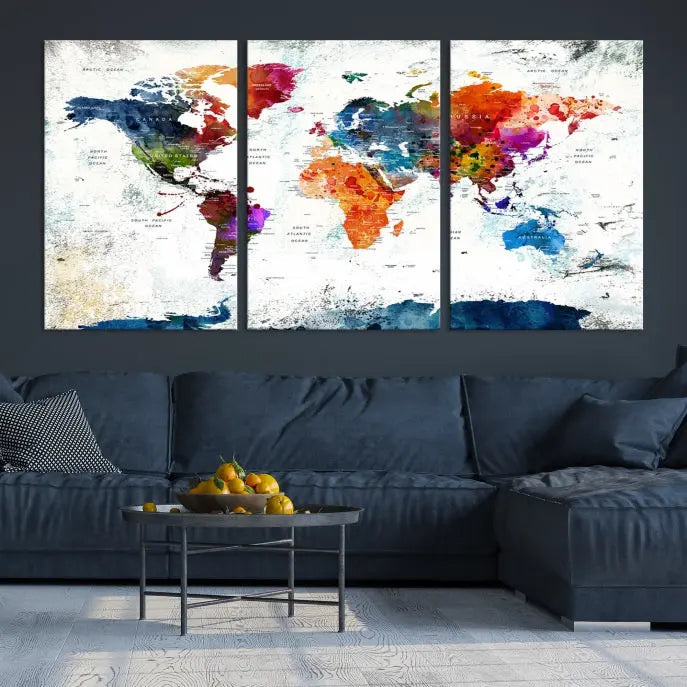 A modern living room boasting a vibrant World Map Wall Art Watercolor Map Canvas Print on the wall.