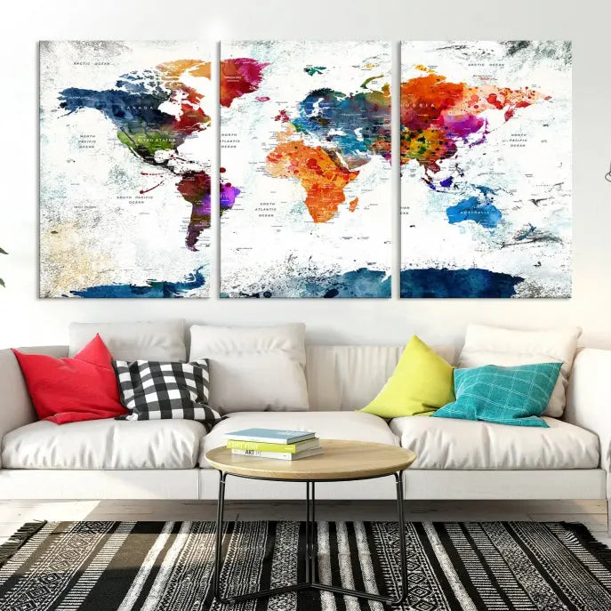 A modern living room boasting a vibrant World Map Wall Art Watercolor Map Canvas Print on the wall.