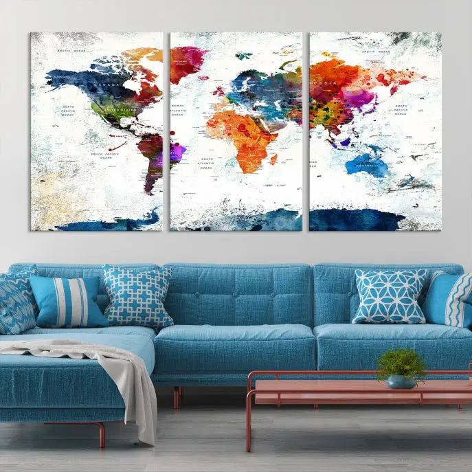 A modern living room boasting a vibrant World Map Wall Art Watercolor Map Canvas Print on the wall.