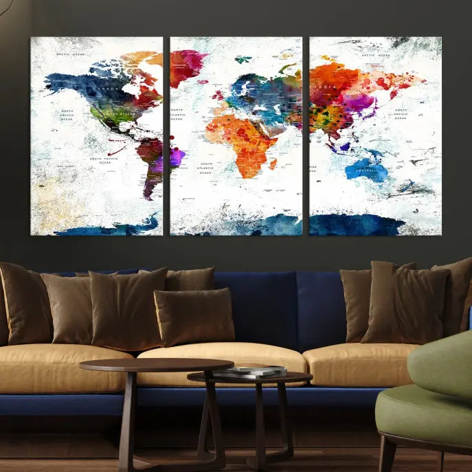 A modern living room boasting a vibrant World Map Wall Art Watercolor Map Canvas Print on the wall.