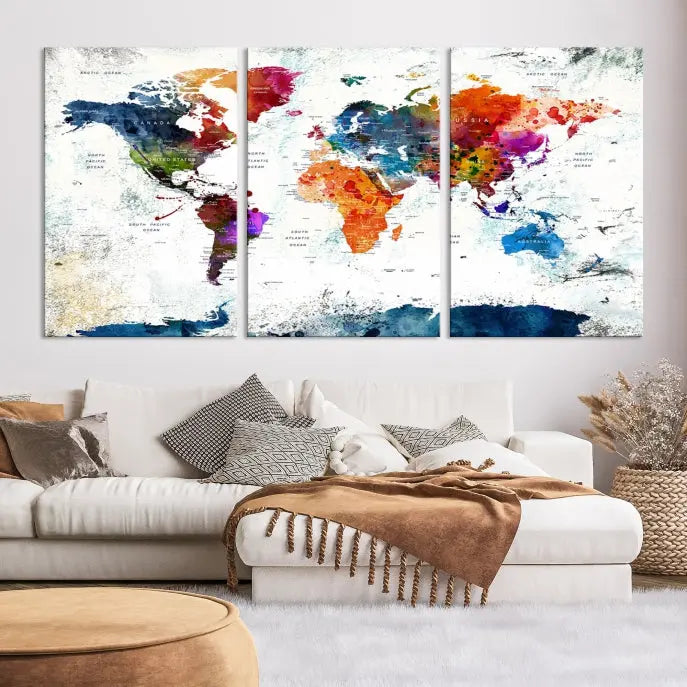 A modern living room boasting a vibrant World Map Wall Art Watercolor Map Canvas Print on the wall.