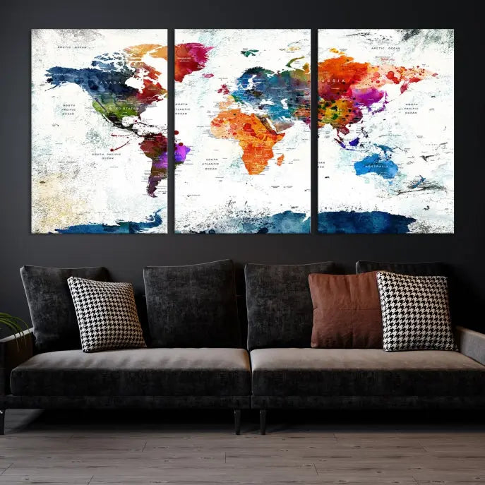 A modern living room boasting a vibrant World Map Wall Art Watercolor Map Canvas Print on the wall.