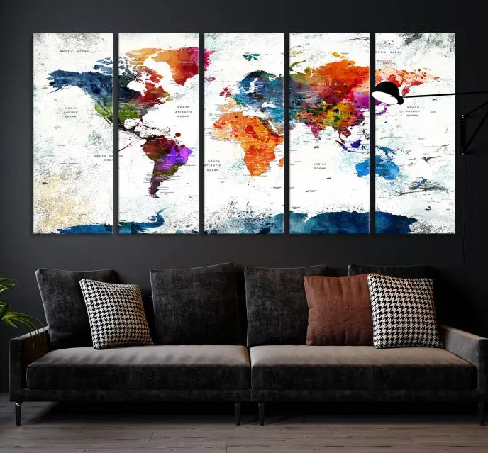 A modern living room boasting a vibrant World Map Wall Art Watercolor Map Canvas Print on the wall.