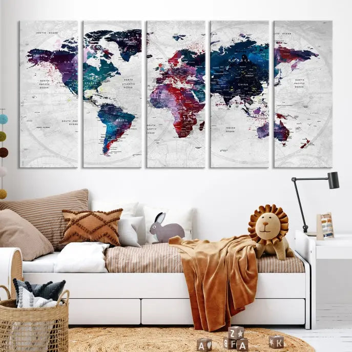 The "World Map Wall Art Watercolor Wall Art Canvas Print," a triptych featuring a vibrant world map, is gallery wrapped on museum-quality canvas and enhances the dark wall.