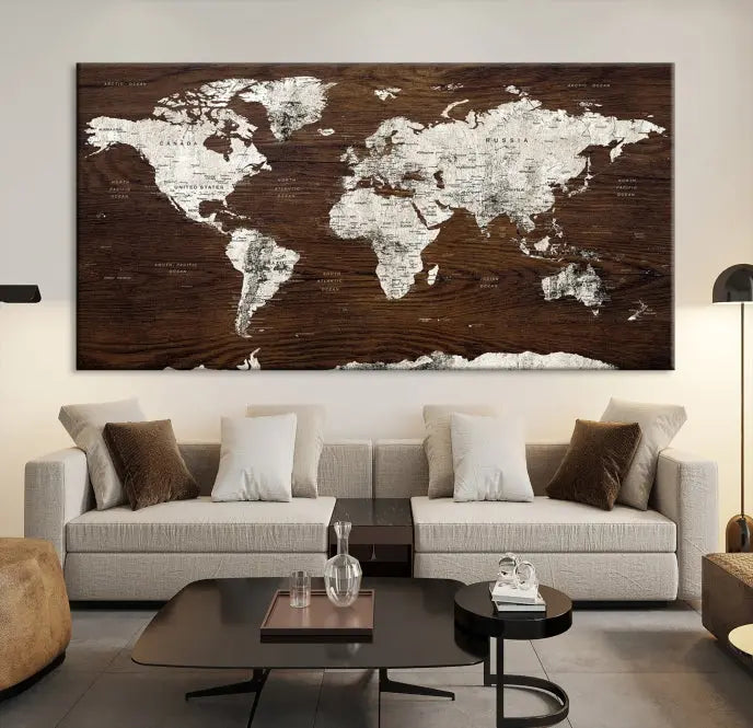 Displayed on the wall is the "World Map Wall Art on Wooden Brown Background World Map Canvas Print," crafted with museum-quality canvas and enhanced by a UV-protective coating to ensure lasting beauty.