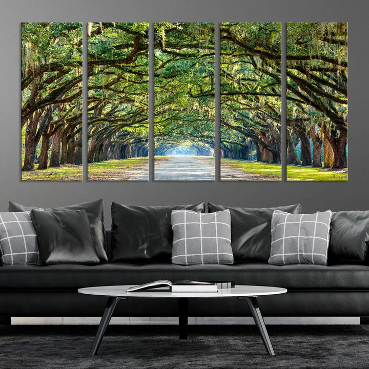 The "Wormsloe State Plantation Driveway Wall Art Canvas Print," crafted on museum-quality canvas with high-resolution printing, showcases a tree-lined path in a modern room.