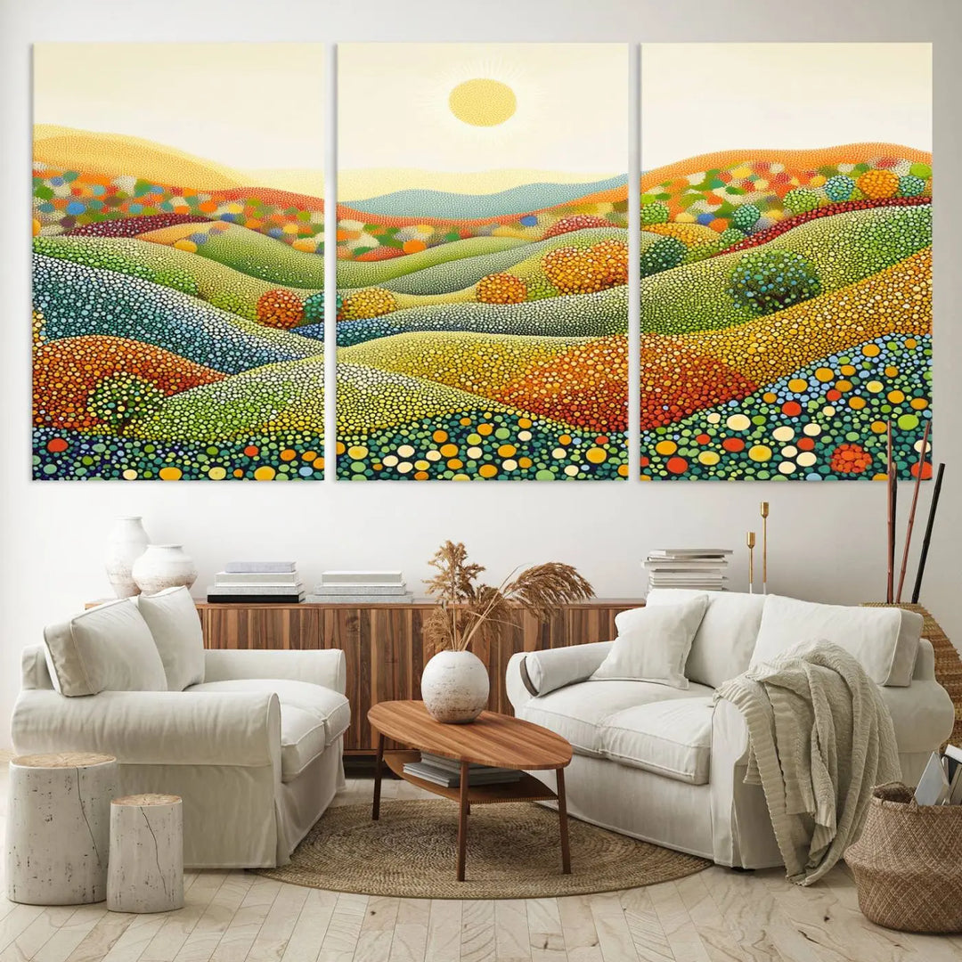 The YAYOI KUSAMA Colorful Dot Art Landscape Canvas, a framed abstract pointillism piece inspired by nature featuring vibrant rolling hills and a sun, adds gallery-quality elegance to your living space.