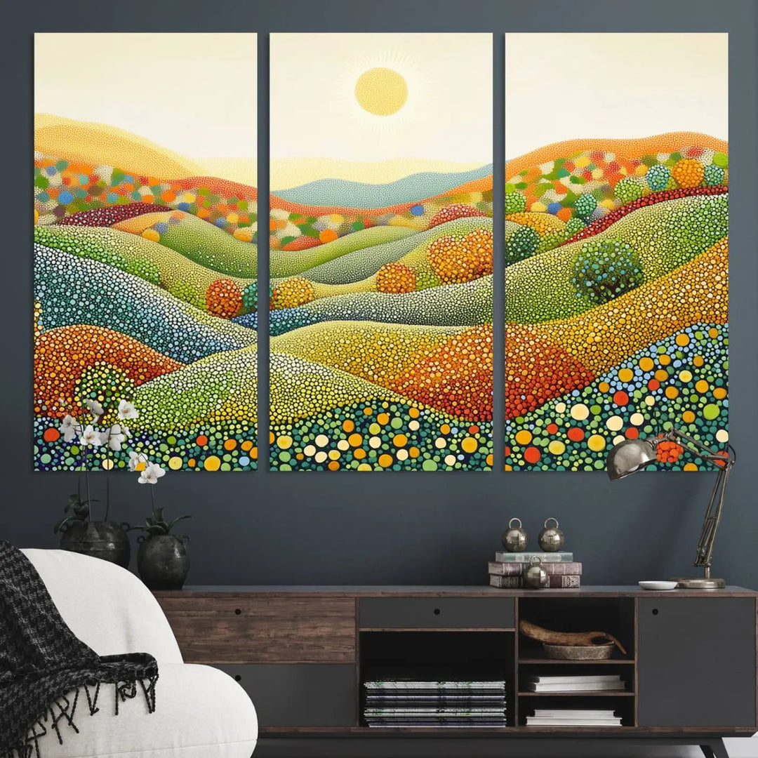 The YAYOI KUSAMA Colorful Dot Art Landscape Canvas, a framed abstract pointillism piece inspired by nature featuring vibrant rolling hills and a sun, adds gallery-quality elegance to your living space.