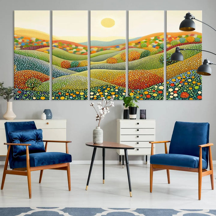 The YAYOI KUSAMA Colorful Dot Art Landscape Canvas, a framed abstract pointillism piece inspired by nature featuring vibrant rolling hills and a sun, adds gallery-quality elegance to your living space.