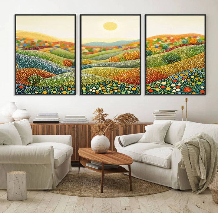 The YAYOI KUSAMA Colorful Dot Art Landscape Canvas, a framed abstract pointillism piece inspired by nature featuring vibrant rolling hills and a sun, adds gallery-quality elegance to your living space.