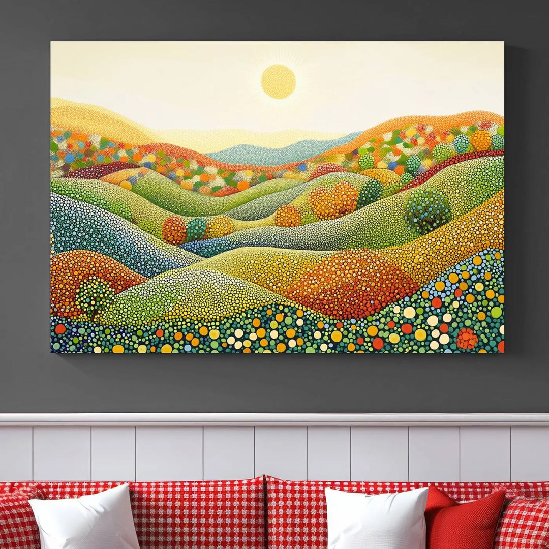 A triptych of the YAYOI KUSAMA Wall Art features a colorful dot art landscape on canvas with vibrant rolling hills and a sun, reminiscent of abstract pointillism inspired by nature.