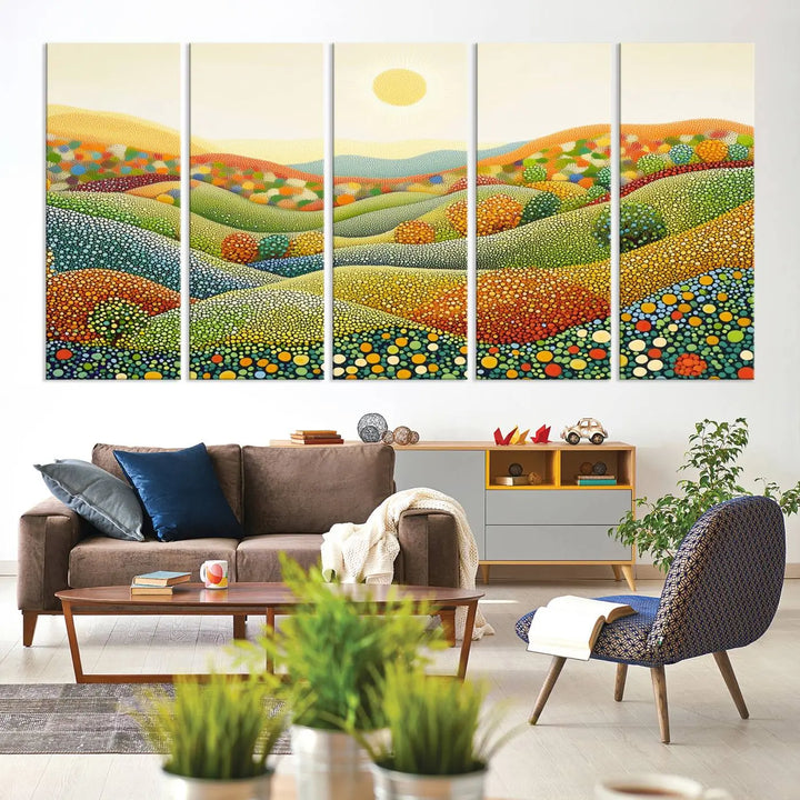 A triptych of the YAYOI KUSAMA Wall Art features a colorful dot art landscape on canvas with vibrant rolling hills and a sun, reminiscent of abstract pointillism inspired by nature.