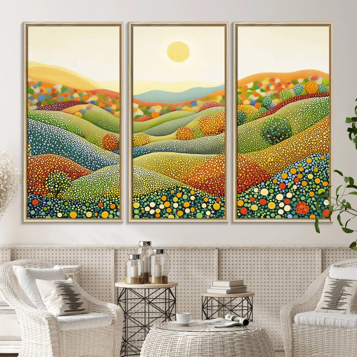 A triptych of the YAYOI KUSAMA Wall Art features a colorful dot art landscape on canvas with vibrant rolling hills and a sun, reminiscent of abstract pointillism inspired by nature.