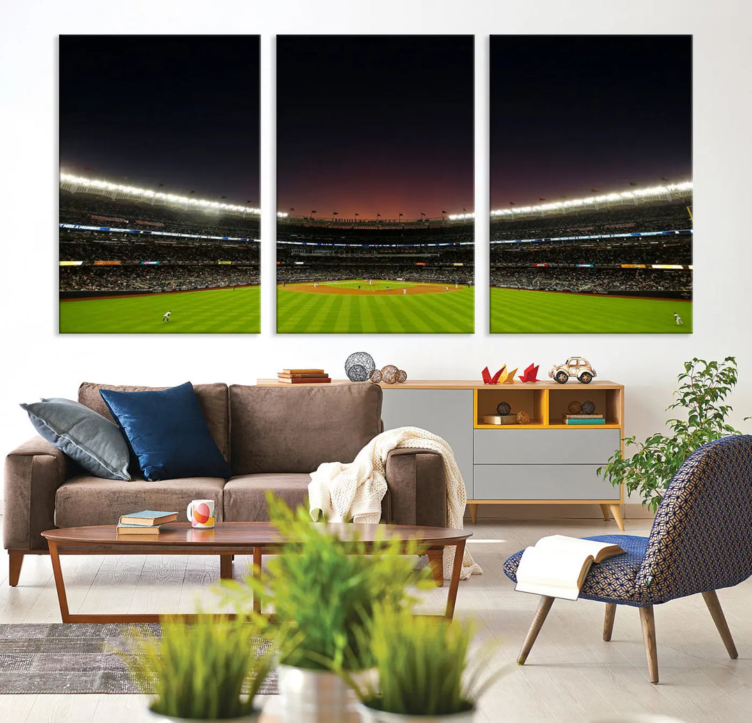 Triple-panel canvas art of Yankee Stadium during a night game, showcasing the illuminated field and vibrant crowd under a dramatic sunset.