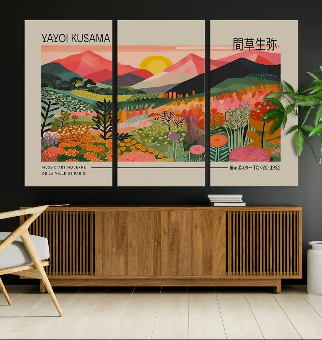 The Yayoi Kusama 1986 Wall Art Print Landscape Canvas Print, a vibrant triptych with abstract landscape art and bold floral motifs, serves as a stunning centerpiece for contemporary décor enthusiasts in this stylish living room.