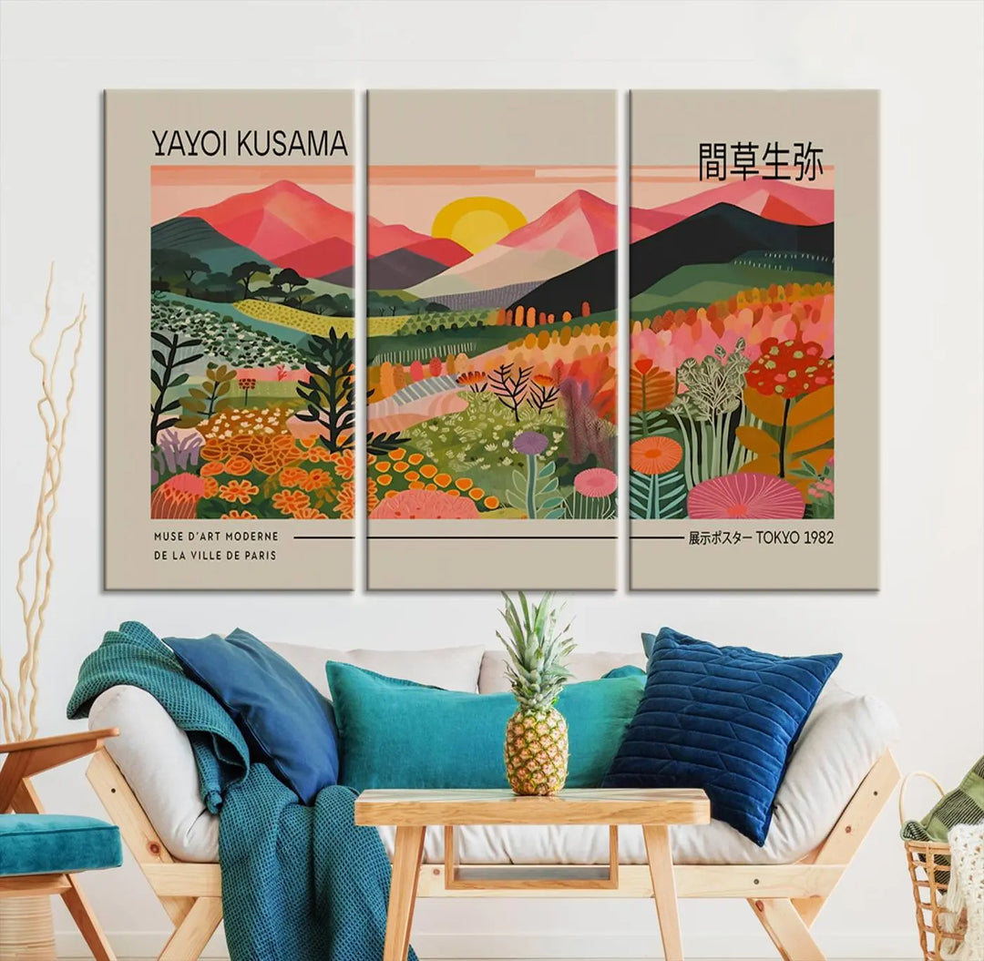 The Yayoi Kusama 1986 Wall Art Print Landscape Canvas Print, a vibrant triptych with abstract landscape art and bold floral motifs, serves as a stunning centerpiece for contemporary décor enthusiasts in this stylish living room.