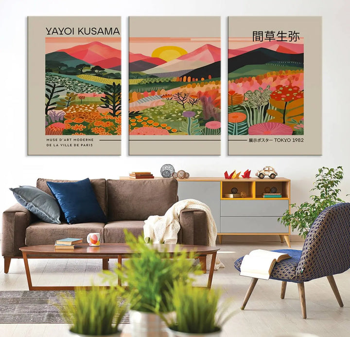 The Yayoi Kusama 1986 Wall Art Print Landscape Canvas Print, a vibrant triptych with abstract landscape art and bold floral motifs, serves as a stunning centerpiece for contemporary décor enthusiasts in this stylish living room.