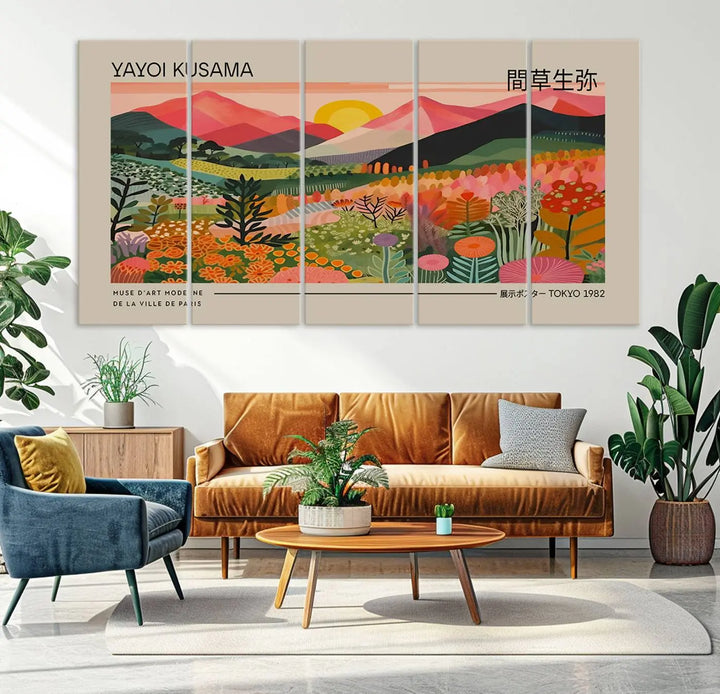 The Yayoi Kusama 1986 Wall Art Print Landscape Canvas Print, a vibrant triptych with abstract landscape art and bold floral motifs, serves as a stunning centerpiece for contemporary décor enthusiasts in this stylish living room.