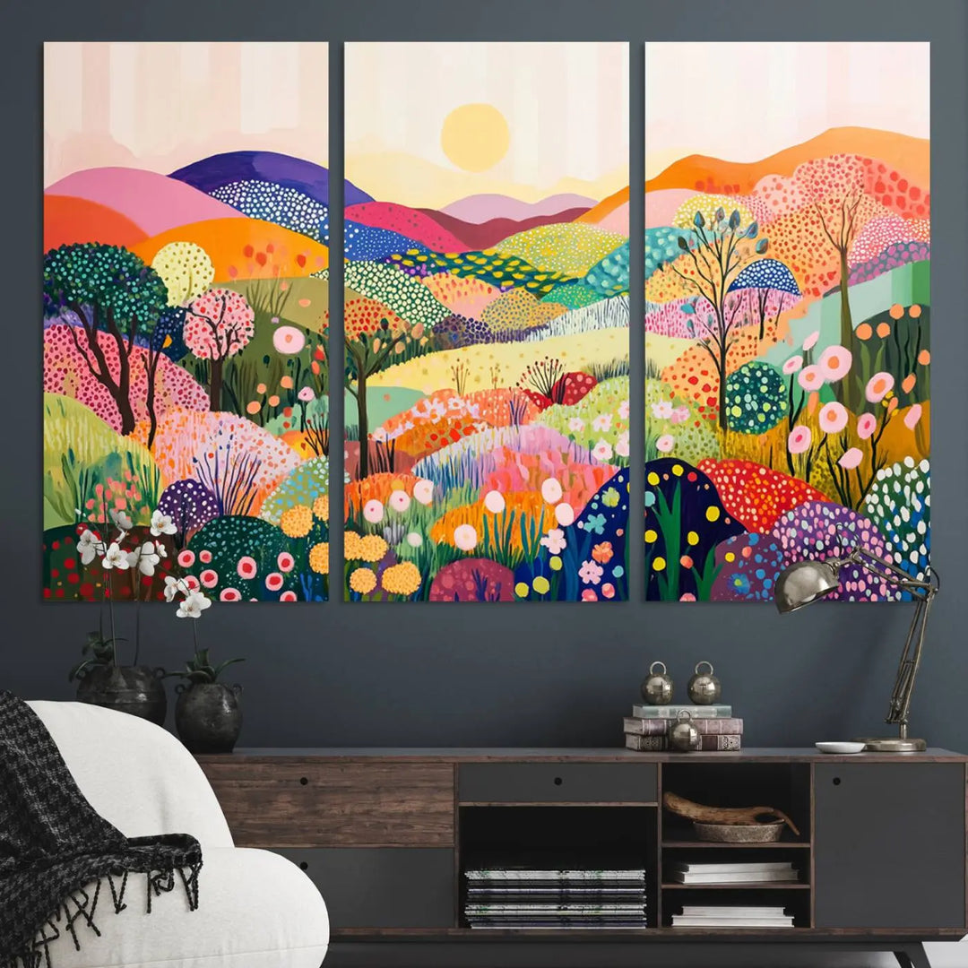 The Yayoi Kusama 1986 Wall Art Print features a vibrant abstract landscape with colorful hills, trees, and flowers. This gallery-quality canvas art piece serves as a stunning focal point on a dark wall.