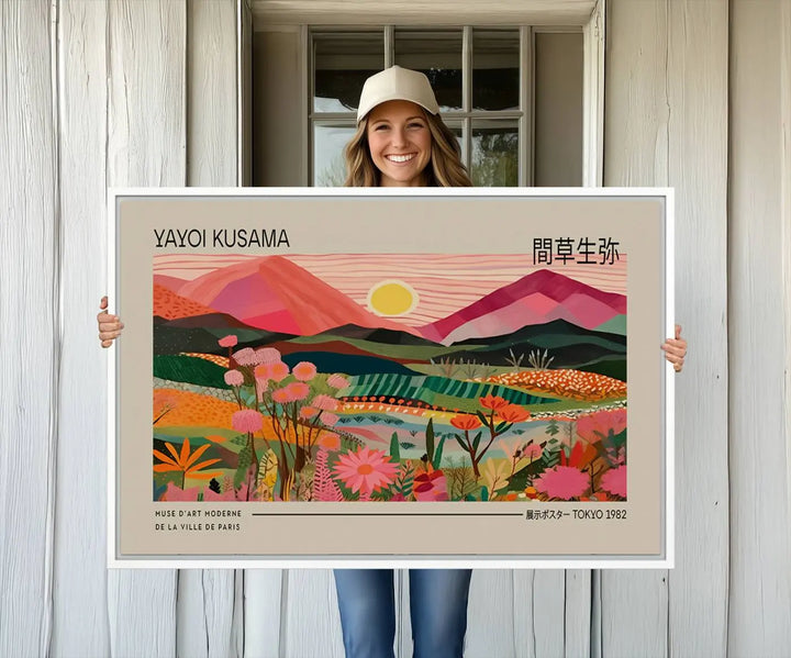 A Yayoi Kusama landscape print features vibrant floral mountains.