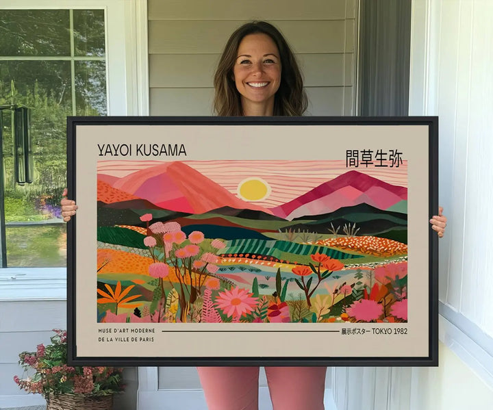 A Yayoi Kusama landscape print features vibrant floral mountains.
