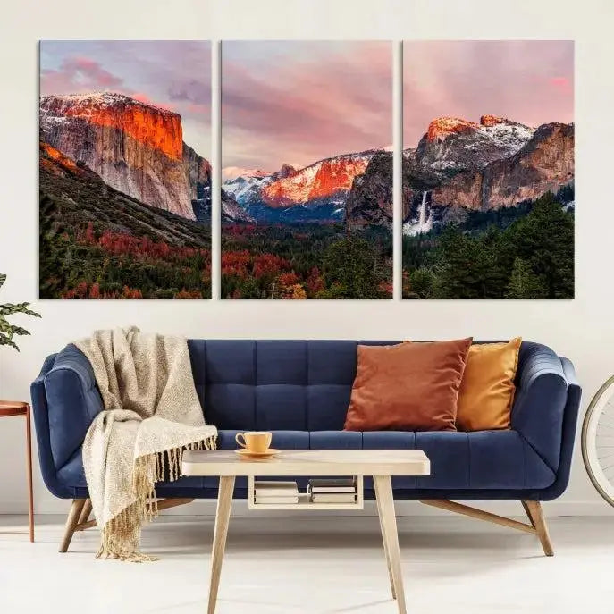 The living room showcases the Yosemite National Park wall art landscape canvas print titled "El Capitan," printed on museum-quality canvas with a UV-protective coating. This captivating piece is displayed as a triptych, capturing the striking mountain landscape at sunset.