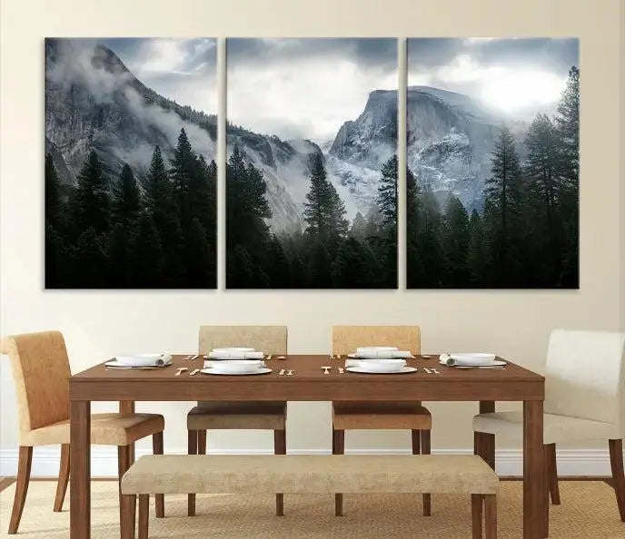 A captivating wall art depicting foggy mountains and the iconic El Capitan from Yosemite National Park graces the wall, infusing the living room with a natural touch.