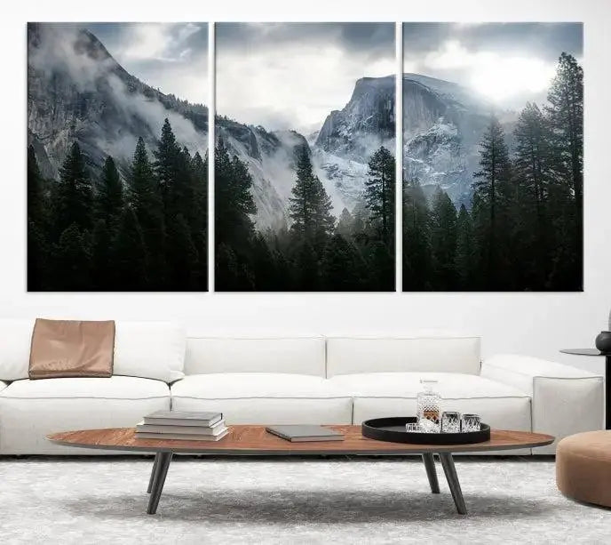 A captivating wall art depicting foggy mountains and the iconic El Capitan from Yosemite National Park graces the wall, infusing the living room with a natural touch.